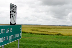 In this Aug. 18, 2016 photo, rain clouds build above maturing rice awaiting harvest outside Lonoke, Ark. Flooding in Louisiana, and a long period of wet weather in Arkansas, threatens to cut yields. Futures prices for rice have ticked up slightly, but economists say it is too early to say whether conditions could force grocery prices upward.