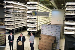 In this Thursday, March 24, 2016, file photograph, New Jersey Gov. Chris Christie, center at podium, addresses a gathering at AeroFarms, a vertical farming operation in Newark, N.J. AeroFarms is now refurbishing an old steel mill in New Jersey and they say it will soon be the site of the world's largest indoor vertical farm. The company says their Newark facility, set to open in September, could produce 2 million pounds of food per year and help with farming land loss and long-term food shortages.