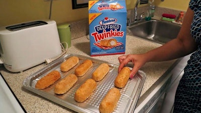 The deep-fried Twinkie is jumping from the state fair to an oven near you. Hostess is launching packaged “Deep Fried Twinkies” that mark its first foray into frozen foods.