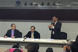 Foxconn, or also known as Hon Hai Precision Industry, spokesman Simon Hsing, right, announces the purchase of a controlling stake in Japan's Sharp Corp. during a press conference at the Taiwan Stock Exchange Corp. in Taipei, Taiwan, Wednesday, March 30, 2016.