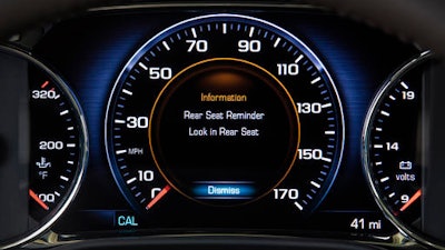 This photo provided by General Motors Co. shows an industry-first Rear Seat Reminder alert on the instrument panel of the 2017 GMC Acadia, a midsize SUV. The system, which is a standard feature, monitors the Acadia’s rear doors. If either one is opened and closed within 10 minutes before the vehicle is started, or if they are opened and closed while the vehicle is running, the Acadia alerts the driver to check the back seat when the vehicle is turned off. GM plans to add the system to additional vehicles throughout its lineup in 2017 and beyond.