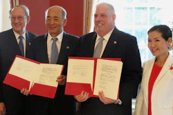 Gov. Larry Hogan, second from right, and Japanese Ambassador to the United States Kenichiro Sasae, second from left, pose for a photo as they sign a Memorandum of Cooperation between Maryland and Japan at the Maryland governor's residence in Annapolis, Md., Wednesday, Aug. 24, 2016. The ambassador said Japan has authorized $2 million to help study building a high-speed magnetic-levitation train between Washington and Baltimore. Maryland first lady Yumi Hogan is standing far right. Maryland Secretary of State John Wobensmith is standing far left.