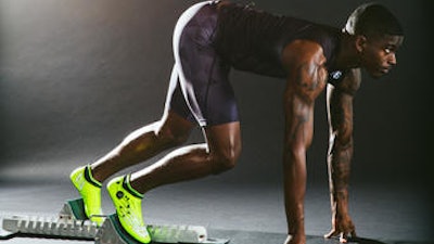 This undated photo provided by New Balance shows U.S. sprinter Trayvon Bromell. For the New Balance track shoes that Bromell will wear during the Olympics, the company turned to 3-D printing technology to test multiple configurations to improve traction and energy transfer.