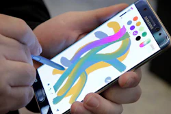 In this July 28, 2016, photo, a color blending feature of the Galaxy Note 7 is demonstrated in New York. Samsung releases an update to its jumbo smartphone and virtual-reality headset, mostly with enhancements rather than anything revolutionary during a preview of Samsung products.