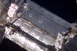 This image provided by NASA shows American astronauts Jeffrey Williams, left, and Kate Rubins taking a spacewalk to hook up a docking port outside the International Space Station on Friday, Aug. 19, 2016. The docking port will be used by future commercial crew capsules. SpaceX delivered this new gateway last month.