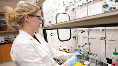 A UTSA student works in an on-campus laboratory.