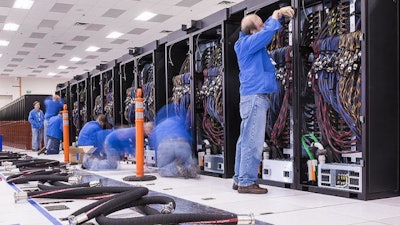 The first row of cabinets for the new Trinity supercomputer at the Lab.