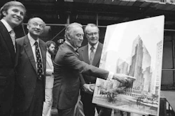 In this June 28, 1978, file photo, then New York Gov Hugh Carey points to an artists' conception of the new New York Hyatt Hotel/Convention facility that will be build on the site of the former Commordore Hotel, in New York. At the launching ceremony are, from left: Donald Trump, son of the city developer Fred C. Trump; Mayor Ed Koch of New York; Carey; and Robert T. Dormer, executive vice president of the Urban Development Corp.