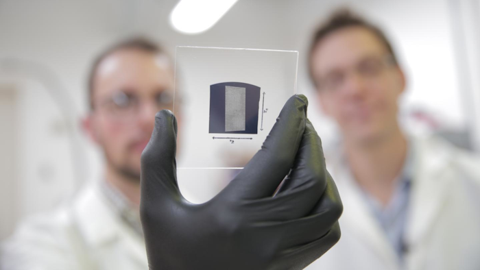 UW–Madison engineers use a solution process to deposit aligned arrays of carbon nanotubes onto 1 inch by 1 inch substrates.