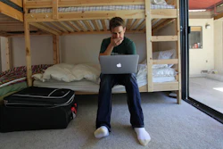 Phillip Cohen in the bedroom of a hacker hostel in Menlo Park, CA.