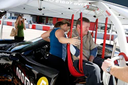 Indy Racing League driver Sam Schmidt exits his modified Corvette on Tuesday, Sept. 27, 2016, in Las Vegas. Schmidt, paralyzed from the neck down in a crash 16 years ago, is set to receive the first autonomous vehicle driver’s license in the U.S.