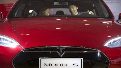 The Model S, featuring partially self-driving technology.