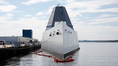The USS Zumwalt sits at dock at the naval station in Newport, R.I., Friday, Sept. 9, 2016. The 610-foot-long warship has an angular shape to minimize its radar signature and cost more than $4.4 billion. It's the most expensive destroyer built for the Navy.