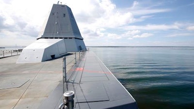 The USS Zumwalt sits at dock at the naval station in Newport, R.I., Friday, Sept. 9, 2016. The 610-foot-long warship has an angular shape to minimize its radar signature and cost more than $4.4 billion. It's the most expensive destroyer built for the Navy.