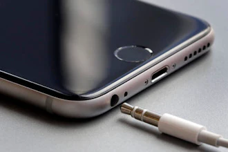 This Sept. 2, 2016, photo shows the earphone jack and charging port on an Apple iPhone 6, in New York. Apple is getting ready to unveil new iPhones on Wednesday, Sept. 7. With experts predicting few big changes from last year's models, speculation has focused on Apple's rumored decision to eliminate the iPhone's traditional headphone jack. It isn't clear what kind of hardware the company will promote instead, but the answer could be a hint at some of Apple's future plans.