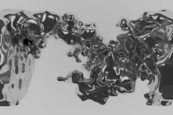 NYU chemists and their colleagues have developed a method to yield highly detailed, three-dimensional images of the insides of batteries. Shown here is a 3D image of the inside of a lithium cell after charging and showing dendrite growth -- deposits than can reduce performance and compromise safety -- between the two electrodes that short-circuited the cell.