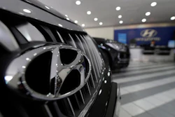 In this April 26, 2016 file photo, the logo of Hyundai Motor Co. is seen on a vehicle displayed at the company's showroom in Seoul, South Korea. Hyundai is recalling about 41,000 small SUVs in the U.S., Thursday, Sept. 15, because a software glitch can stop the vehicles from accelerating. The recall came after pressure from the National Highway Traffic Safety Administration. It covers 2016 Tucson models with seven-speed dual-clutch automatic transmissions made from May 20, 2015 to May 31, 2016.