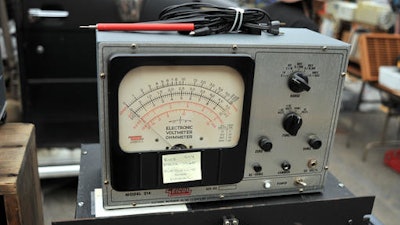 In this Sept. 18, 2016, photo, a vintage electronic voltmeter/ohmmeter, circa 1960, is displayed at MIT's Radio Society flea market on the campus of the Massachusetts Institute of Technology in Cambridge, Mass. Every third Sunday, MIT's Radio Society hosts a parking-lot flea market that's part yard sale and part curio museum from the world of electronics. Vendors come to hawk radio equipment, but also vintage Macintosh computers, castaway musical instruments, baubles of all kinds and the occasional space capsule. The storied market is part of a circuit of flea markets hosted by radio clubs across New England, but this one is known for attracting the strangest of wares.