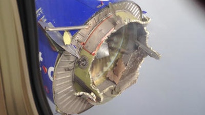 This Saturday, Aug. 27, 2016, file photo shows an engine through a window of a Southwest Airlines flight. The flight from New Orleans bound for Orlando, Fla., diverted to Pensacola, Fla., after the pilot detected something had gone wrong with the engine. On Monday, Sept. 12, the National Transportation Safety Board said that an engine fan blade on the jet broke off and the stub of the blade shows signs of metal fatigue. The plane made a safe emergency landing after shrapnel from the broken engine hit the fuselage.