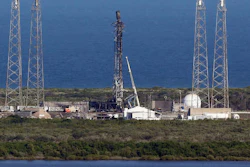 This Thursday, Sept. 8, 2016 file photo shows the damaged SpaceX launch complex 41 at Cape Canaveral Air Force Station in Florida. On Friday, Sept. 23, 2016, SpaceX said a breach in its rocket's helium system may have caused the devastating explosion three weeks ago at Cape Canaveral on Sept. 1.