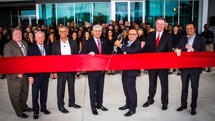 Cutting the ribbon at the new ABB Senatobia, Miss., facility are: (l to r) Tim Climer, Tate County Economic Development; Micky Mulligan, Mississippi Development Authority; Ben Buley, ABB; Mississippi Governor Phil Bryant; Giampiero Frisio, ABB; Franklin Sullivan, ABB; Michele Putignano, ABB.