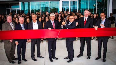 Cutting the ribbon at the new ABB Senatobia, Miss., facility are: (l to r) Tim Climer, Tate County Economic Development; Micky Mulligan, Mississippi Development Authority; Ben Buley, ABB; Mississippi Governor Phil Bryant; Giampiero Frisio, ABB; Franklin Sullivan, ABB; Michele Putignano, ABB.