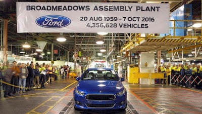 In this hand out photo supplied by Ford Motor Co. Australia, the world's last six-cylinder, rear-wheel drive Falcon XR6 rolls off the assembly line at Ford Motor's Broadmeadows plant in Melbourne, Australia, Friday, Oct 7, 2016. Ford ended 91 years of car manufacturing in Australia with 600 employees loosing their jobs. The remaining two Australian car makers due to close their doors next year.
