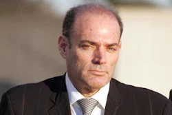 In this Jan. 18, 2008 file photo, David Brooks leaves the federal courthouse in Central Islip, N.Y. On Thursday, Oct. 27, 2016, Brooks, the founder of America’s leading supplier of body armor to the U.S. military, died in prison while serving a 17-year sentence for running a massive stock fraud scheme.