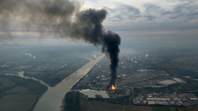 A huge cloud of dark smoke seen at the BASF chemical plant site in Ludwigshafen, Germany, Monday Oct. 17, 2016.