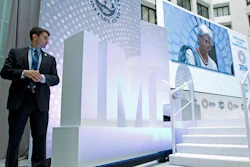 International Monetary Fund (IMF) Managing Director Christine Lagarde is seen on a video screen as she speaks at CNN Debate on the Global Economy during World Bank/IMF Annual Meetings at IMF headquarters in Washington, Thursday, Oct. 6, 2016.