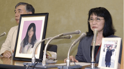 Yukimi Takahashi, right, mother of Matsuri, with lawyer Hiroshi Kawahito, speaks to journalists at a news conference in Tokyo after her daughter's suicide was recognized as “karoshi,” or death from overwork. Matsuri Takahashi’s dream career at Japan’s top ad agency, Dentsu, ended with her suicide after her overtime exceeded 100 hours a month.