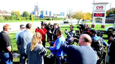 Trey Cocking, the city manager of Atchison, Kan., addresses the media outside of the CVS Pharmacy after a chemical incident occurred at the MPG Ingredients plant on Friday Oct. 21, 2016, in Atchison, Kan The Kansas Department of Emergency Management said multiple people who suffered respiratory problems because of the noxious cloud that formed were taken to hospitals. Their conditions have not been released.