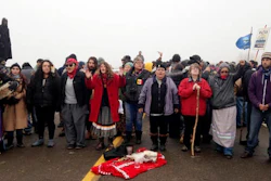 Protesters against the construction of the Dakota Access oil pipeline block a highway in near Cannon Ball, N.D., on Wednesday, Oct. 26, 2016. Law enforcement officials have asked people protesting the Dakota Access oil pipeline to vacate an encampment on private land, and the protesters said no. Protesters are trying to halt construction of the pipeline they fear will harm cultural sites and drinking water for the Standing Rock Sioux.
