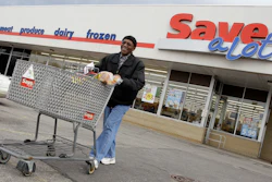 In this file photo, shopper Andrew Boston leaves the Save-a-Lot grocery store in Northfield, OH.
