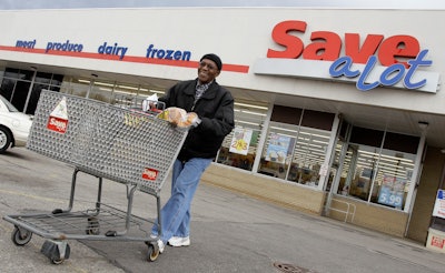 In this file photo, shopper Andrew Boston leaves the Save-a-Lot grocery store in Northfield, OH.