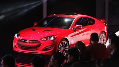 In this file photo, the Hyundai Genesis Coupe is unveiled at the North American International Auto Show in Detroit. Hyundai is recalling more than 84,000 cars in the U.S. because a wiring problem can cause the front passenger air bag to malfunction.