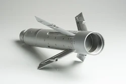 With a mid-body guidance section that fits between the motor and the warhead, the APKWS transforms a standard unguided munition into a highly accurate precision laser-guided rocket.