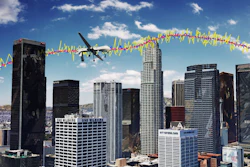 Simulation results for an unmanned drone flying over downtown Los Angeles showing the true trajectory (red line), with GPS navigation only (yellow line), and GPS aided with cellular signals (blue line).