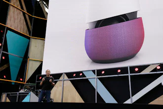 In this May 18, 2016 file photo, Google vice president Mario Queiroz gestures while introducing the new Google Home device during the keynote address of the Google I/O conference in Mountain View, Calif. On Tuesday, Oct. 4, 2016, the search giant will ramp up its consumer electronics strategy with expected announcements of new gadgets including new smartphones and an internet-connected personal-assistant for the home similar to Amazon’s Echo speaker. All are intended to showcase Google’s software and online services.
