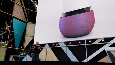 In this May 18, 2016 file photo, Google vice president Mario Queiroz gestures while introducing the new Google Home device during the keynote address of the Google I/O conference in Mountain View, Calif. On Tuesday, Oct. 4, 2016, the search giant will ramp up its consumer electronics strategy with expected announcements of new gadgets including new smartphones and an internet-connected personal-assistant for the home similar to Amazon’s Echo speaker. All are intended to showcase Google’s software and online services.