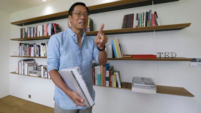 In this Aug. 3, 2016 photo, Hyundai Card CEO Ted Chung gestures while speaking during an interview at his office in Seoul, South Korea. Chung, 56, is a maverick among South Korea’s aloof, conservative business elites, whose corporate empires, or chaebol, dominate Asia’s fourth-largest economy. Chung is changing his company’s culture as he pushes digital advances he says are vital for its survival.