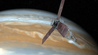 This undated artist's rendering shows NASA's Juno spacecraft making one of its close passes over Jupiter. NASA said Wednesday, Oct. 19, 2016, that the Juno spacecraft circling Jupiter went into safe mode, turning off its camera and instruments. The space agency said the Juno craft is healthy as engineers try to figure out what went wrong.