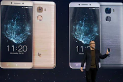 Rob Chandhok, LeEco North America chief research and development officer, holds a LePro 3 phone while speaking at an event in San Francisco, Wednesday, Oct. 19, 2016.