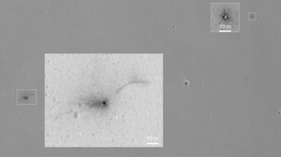 This Oct. 25, 2016 image annotated and provided by NASA shows the area where the European Space Agency's Schiaparelli test lander reached the surface of Mars, with magnified insets of three sites where components of the spacecraft hit the ground. The image was captured by NASA's Mars Reconnaissance Orbiter. ESA lost communication with Schiaparelli shortly before the probe was supposed to touch down on Oct. 19.
