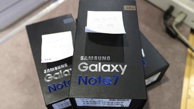 Returned boxes of Samsung Electronics' Galaxy Note 7 smartphones are placed at a shop of South Korean mobile carrier in Seoul, South Korea, Thursday, Oct. 13, 2016. Samsung Electronics says it has expanded its recall of Galaxy Note 7 smartphones in the U.S. to include all replacement devices the company offered as a presumed safe alternative after the original Note 7s were found prone to catch fire.