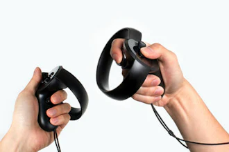 This photo provided by Oculus shows a set of Oculus Touch hand-held controllers, expected to go on sale Dec. 6, 2016. Oculus hopes people find them more comfortable and intuitive to use than traditional video game controllers. Users can make gestures and grasp virtual objects within the simulated worlds projected by Oculus Rift headsets.