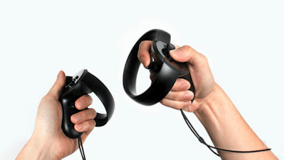 This photo provided by Oculus shows a set of Oculus Touch hand-held controllers, expected to go on sale Dec. 6, 2016. Oculus hopes people find them more comfortable and intuitive to use than traditional video game controllers. Users can make gestures and grasp virtual objects within the simulated worlds projected by Oculus Rift headsets.