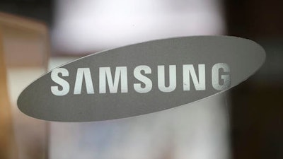In this photo taken on Wednesday, Oct. 5, 2016, the corporate logo of Samsung Electronics Co. is seen at its shop in Seoul, South Korea. Samsung Electronics Co. estimated its profit rose more than expected in the July-September quarter despite the unprecedented recall of its flagship smartphones.