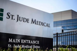 This Wednesday, July 22, 2015, file photo shows St. Jude Medical corporate headquarters, in Little Canada, Minn., just north of St. Paul. Medical device maker St. Jude Medical is warning doctors and patients about a rare battery defect in some of its implantable heart devices that can cause them to fail much earlier than expected.
