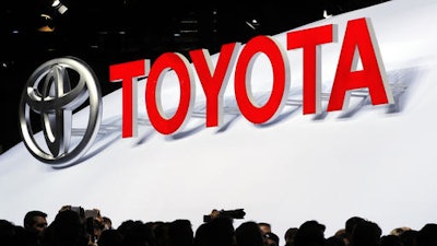 Toyota will test a new car-sharing system next year that lets users unlock doors and start cars with their smartphones. The Smart Key Box system eliminates the need for a physical key. Toyota will test the system in San Francisco with the Getaround car-sharing service starting in January 2017.